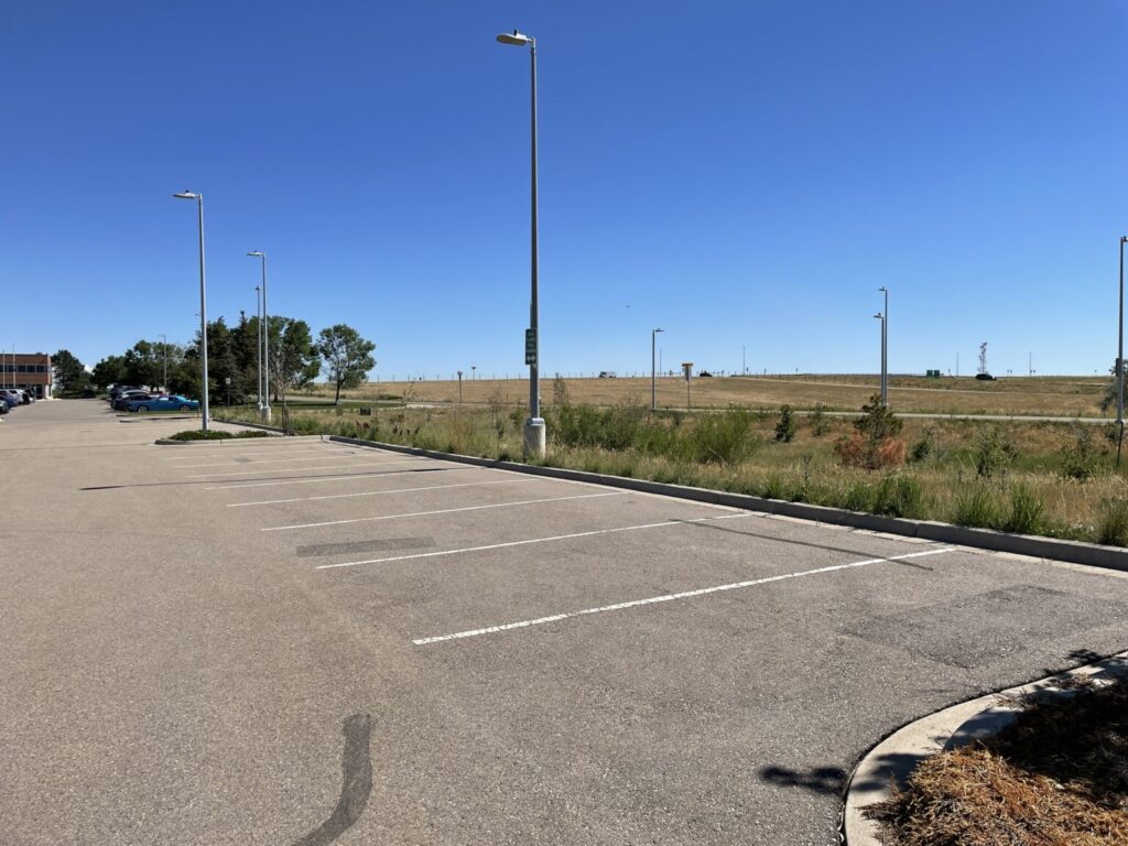 Dedicated parking spaces for High Plains Trail users at the E470 Administration building.